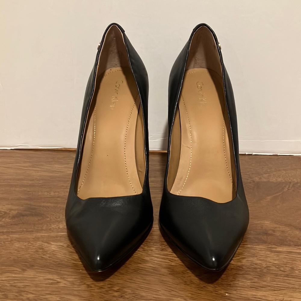 Calvin Klein high heels. Size 7 or 7.5 (don't see a size on the shoe).